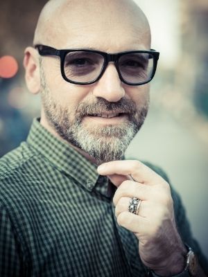 bald man with wayfarer glasses