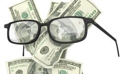 glasses with $100 bills