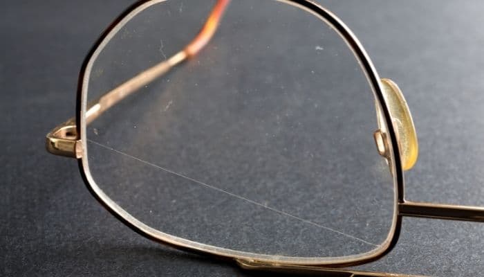 closeup of scratched eyeglass lens