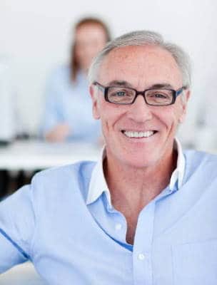 older man wearing glasses that are too narrow