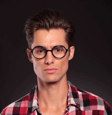 young man wearing round glasses