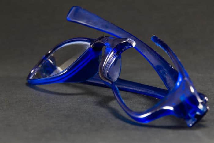 broken blue eyeglasses