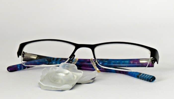glasses and a couple contact lens packets