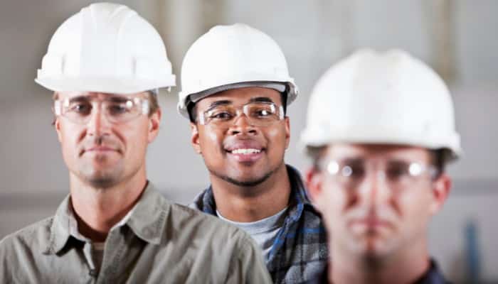 men in hardhats and safety glasses