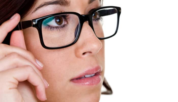 closeup of woman wearing glasses