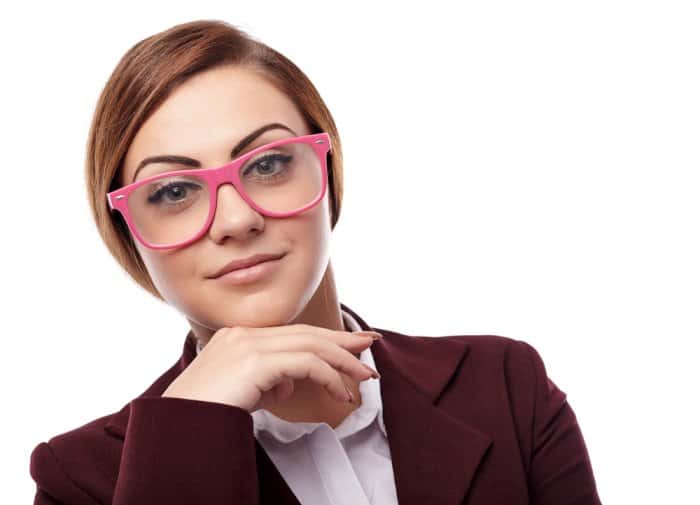 woman wearing pink oversize glasses