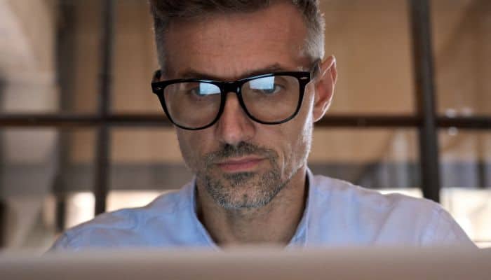 man in glasses shopping online