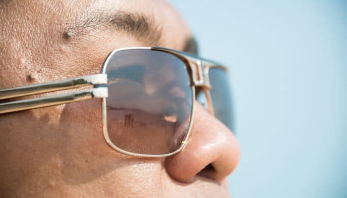 closeup profile man with flat top aviator sunglasses