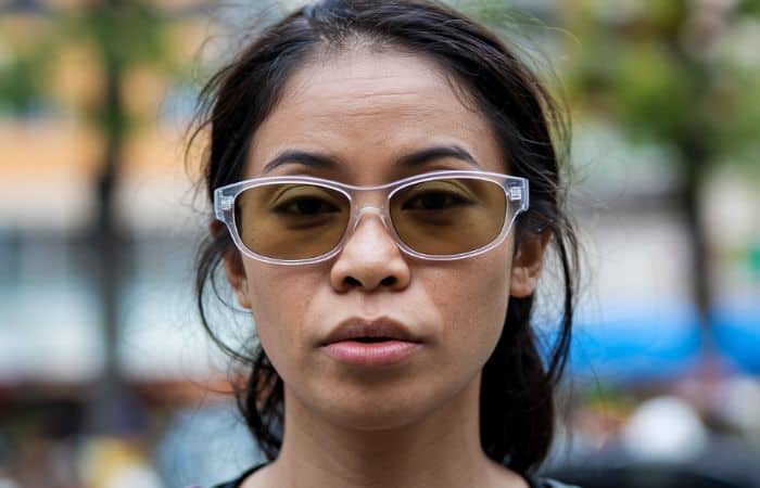woman with a low nose bridge wearing sunglasses